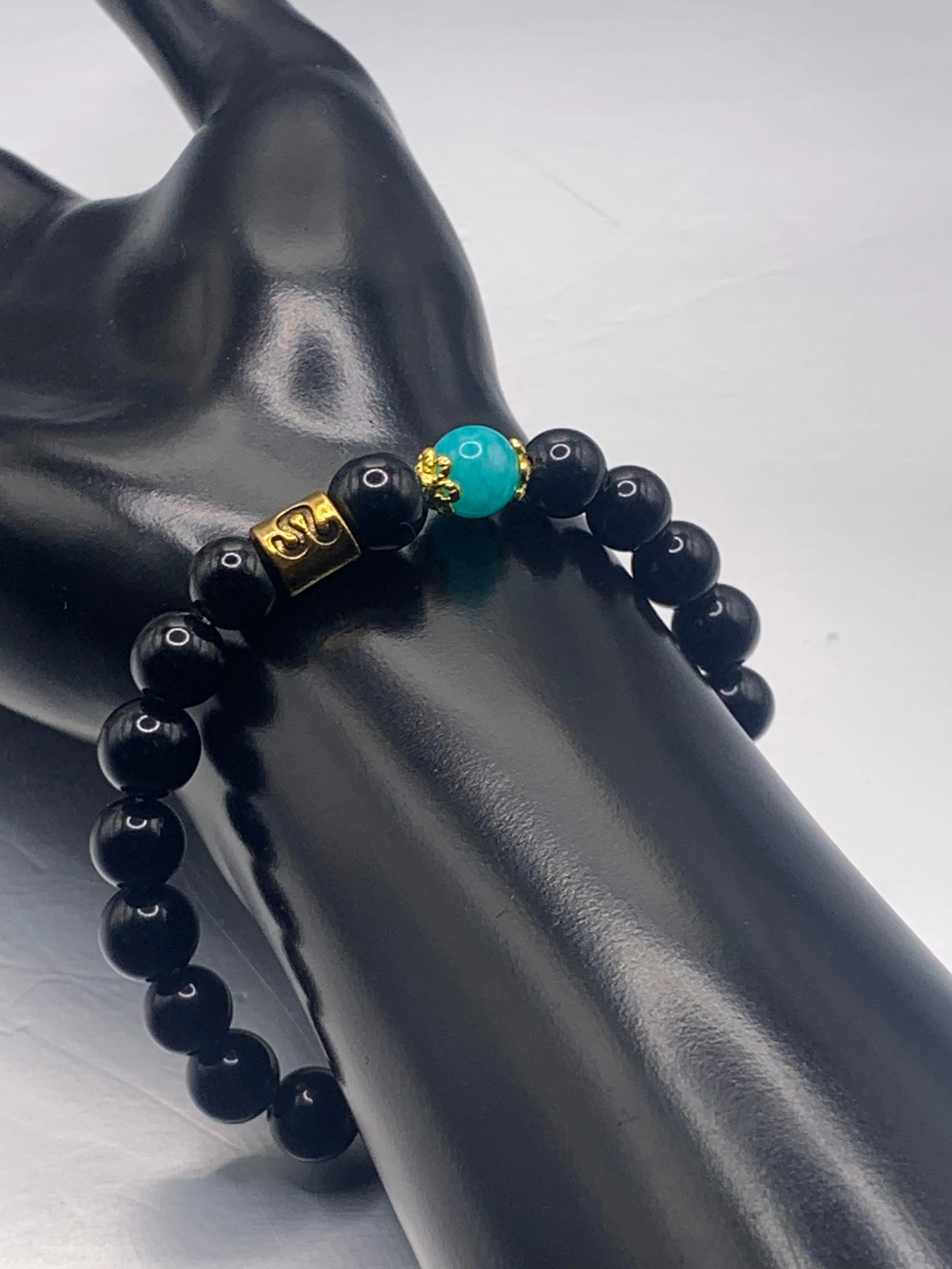 Leo Zodiac black obsidian with aquamarine chalcedony elastic beaded bracelet with gold accents