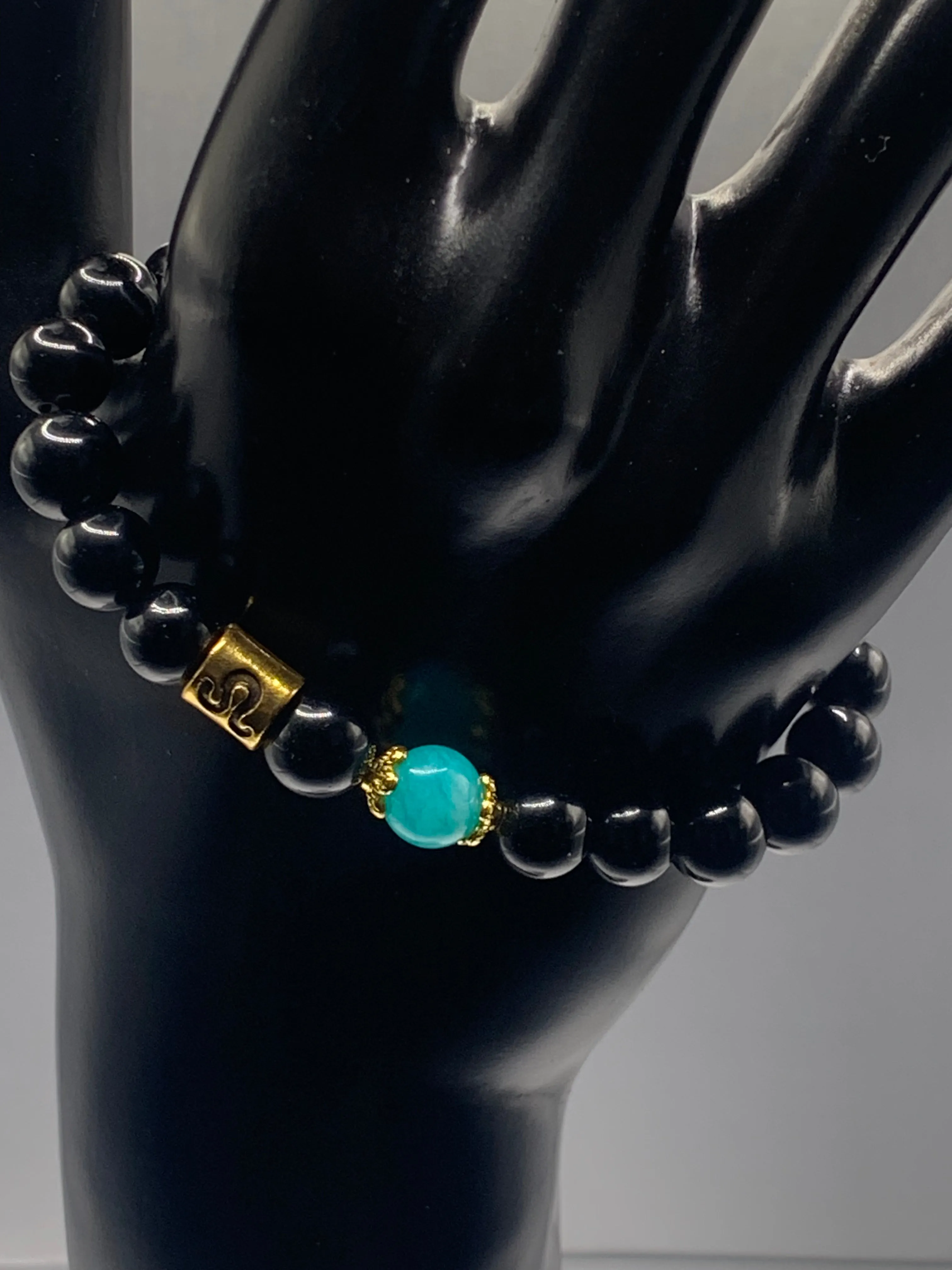 Leo Zodiac black obsidian with aquamarine chalcedony elastic beaded bracelet with gold accents